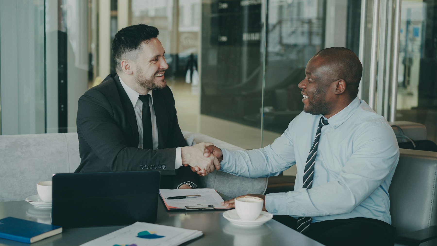 Colleagues shaking hands after a productive meeting